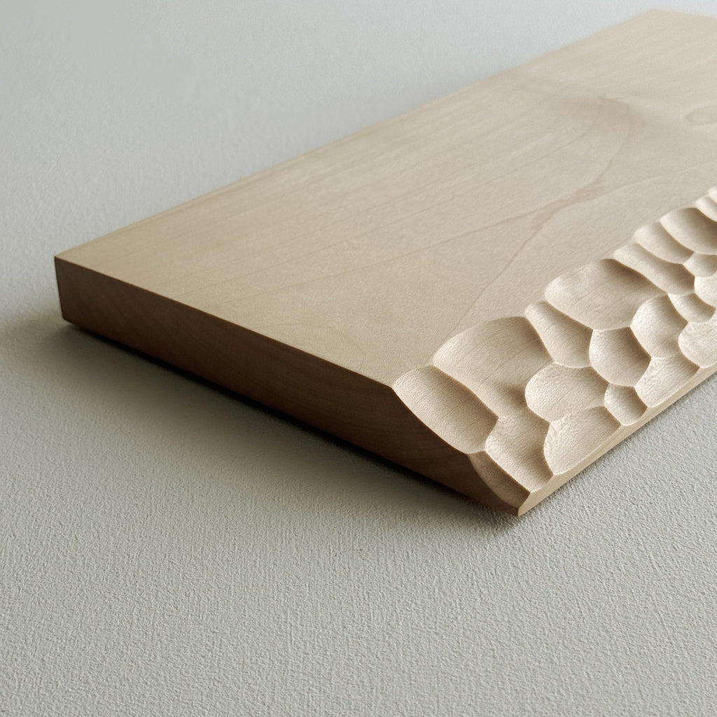 Sculpted presentation board set in sycamore
