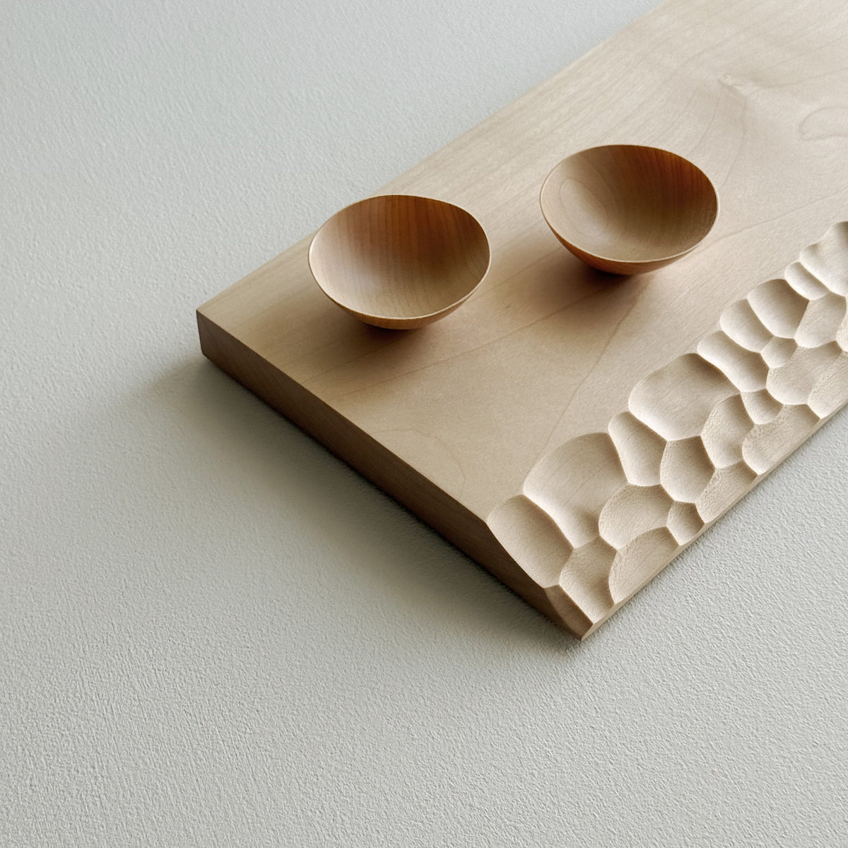 Sculpted presentation board set in sycamore