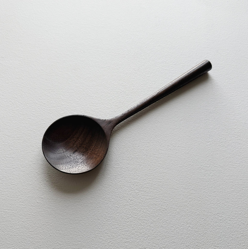 Serving spoon in dark walnut