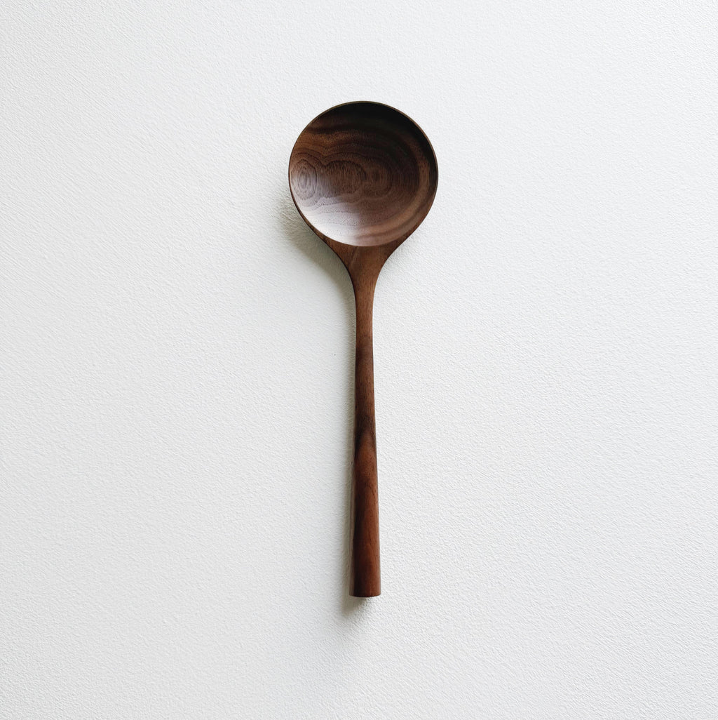 Serving spoon in tanned walnut