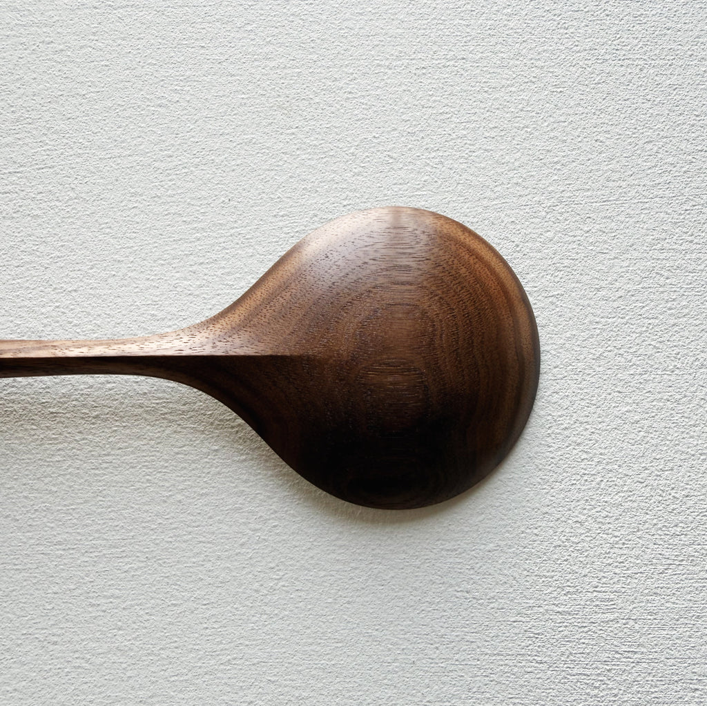 Serving spoon in tanned walnut