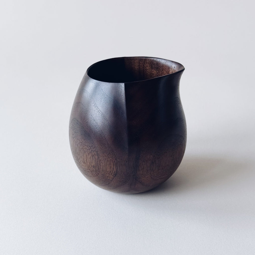 Small jug in dark walnut