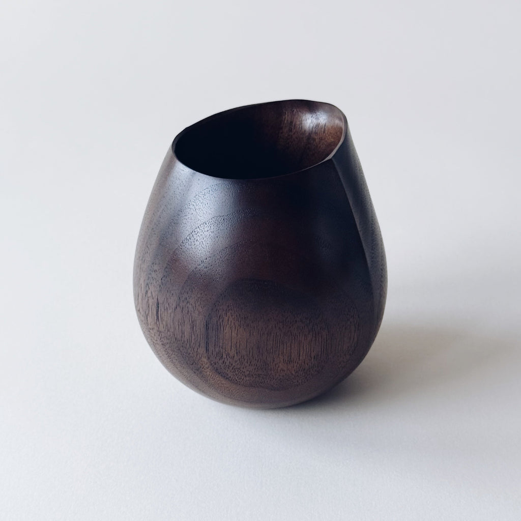 Small jug in dark walnut