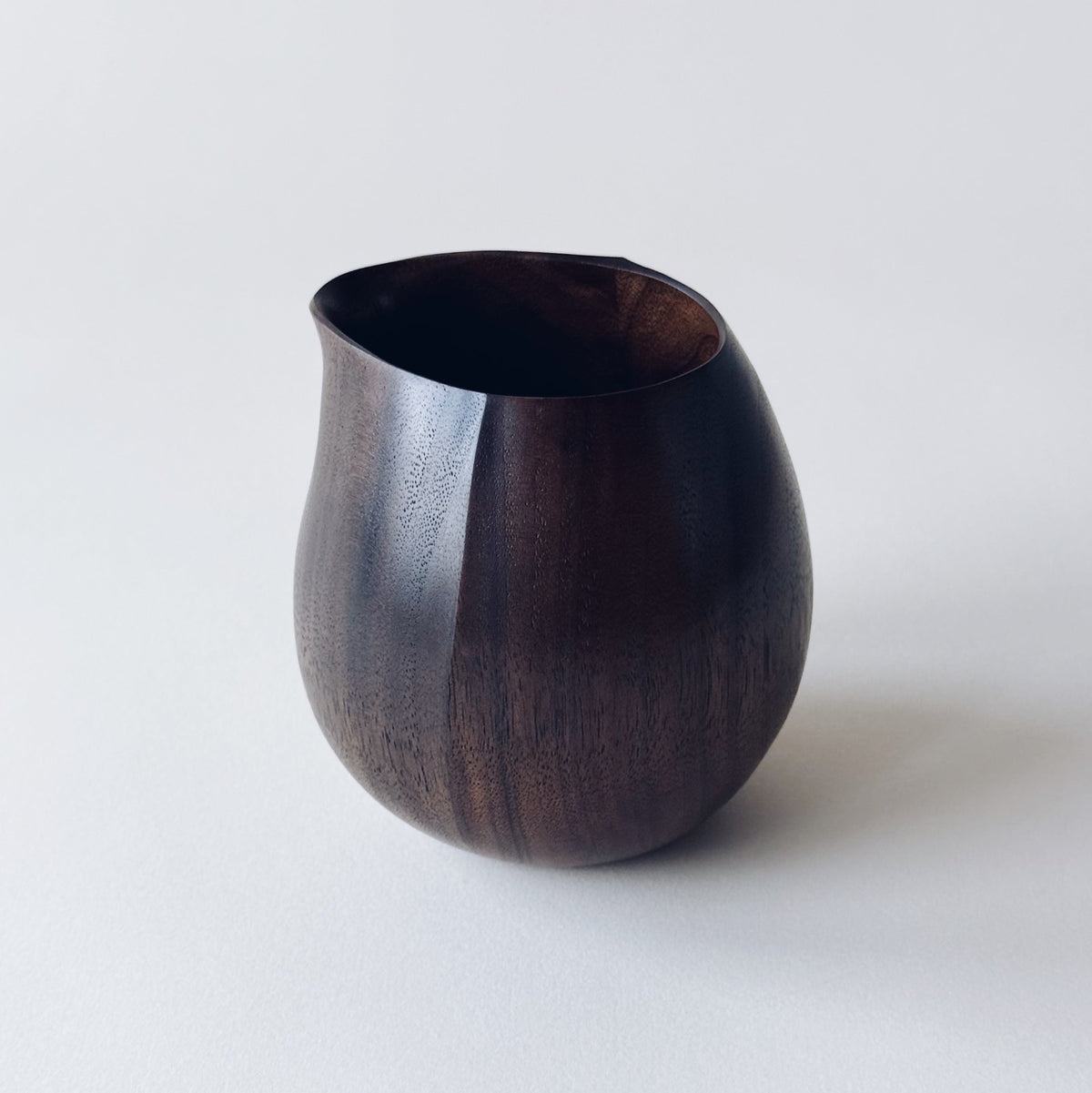 Small jug in dark walnut