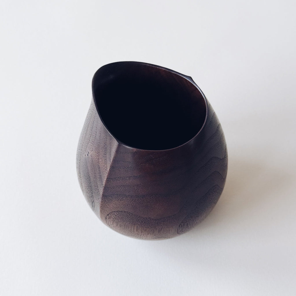 Small jug in dark walnut