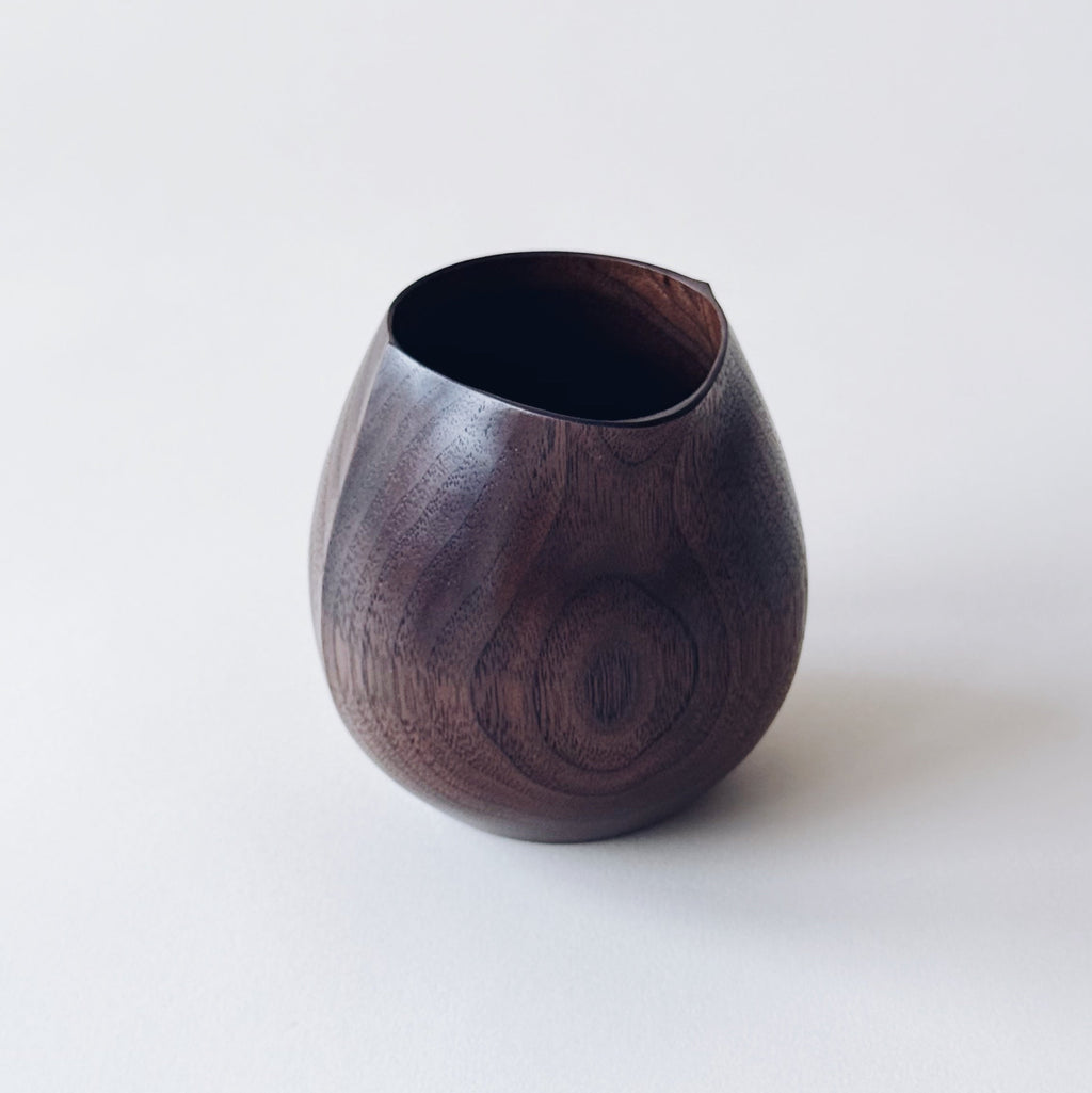 Small jug in dark walnut