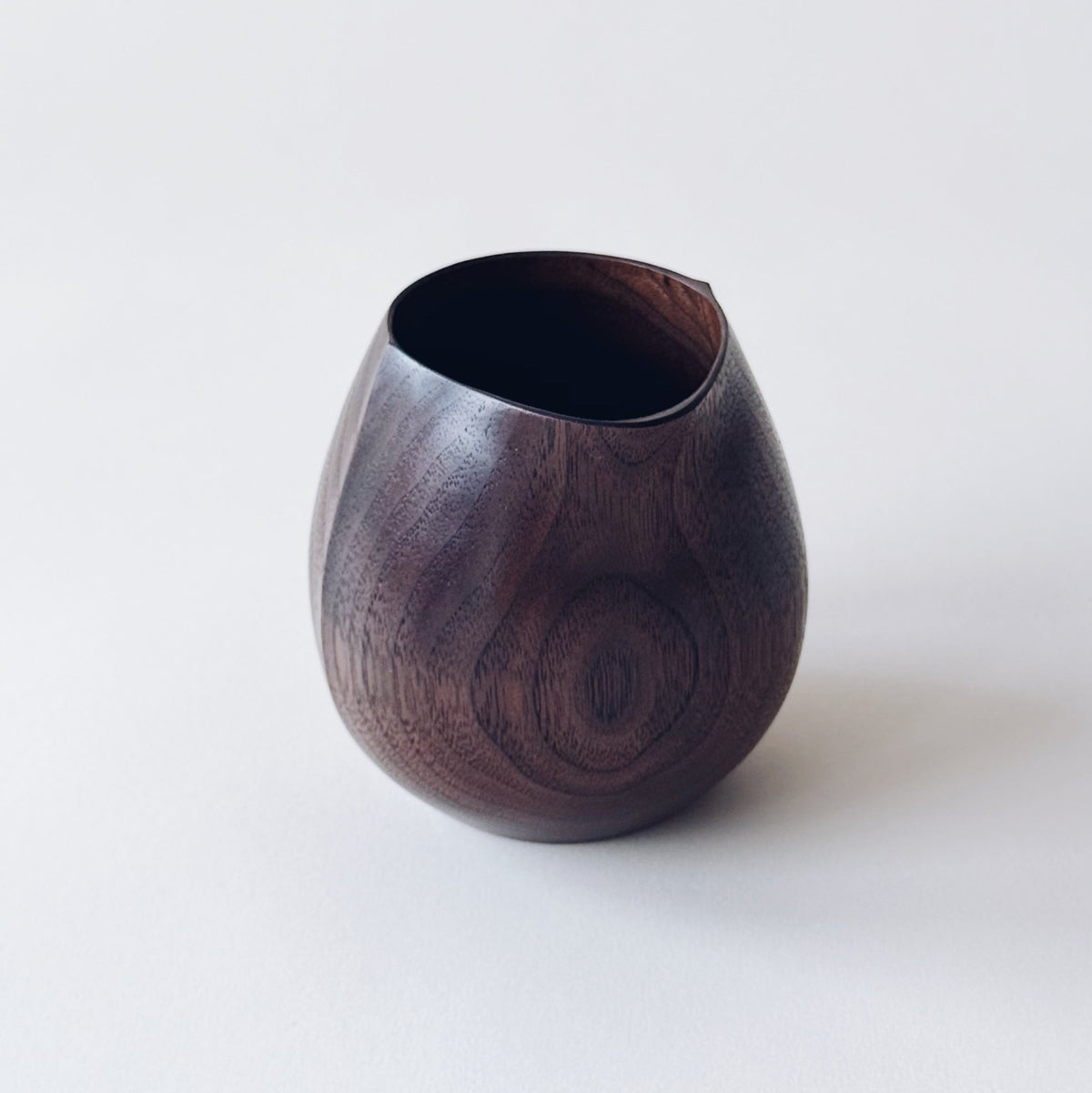 Small jug in dark walnut