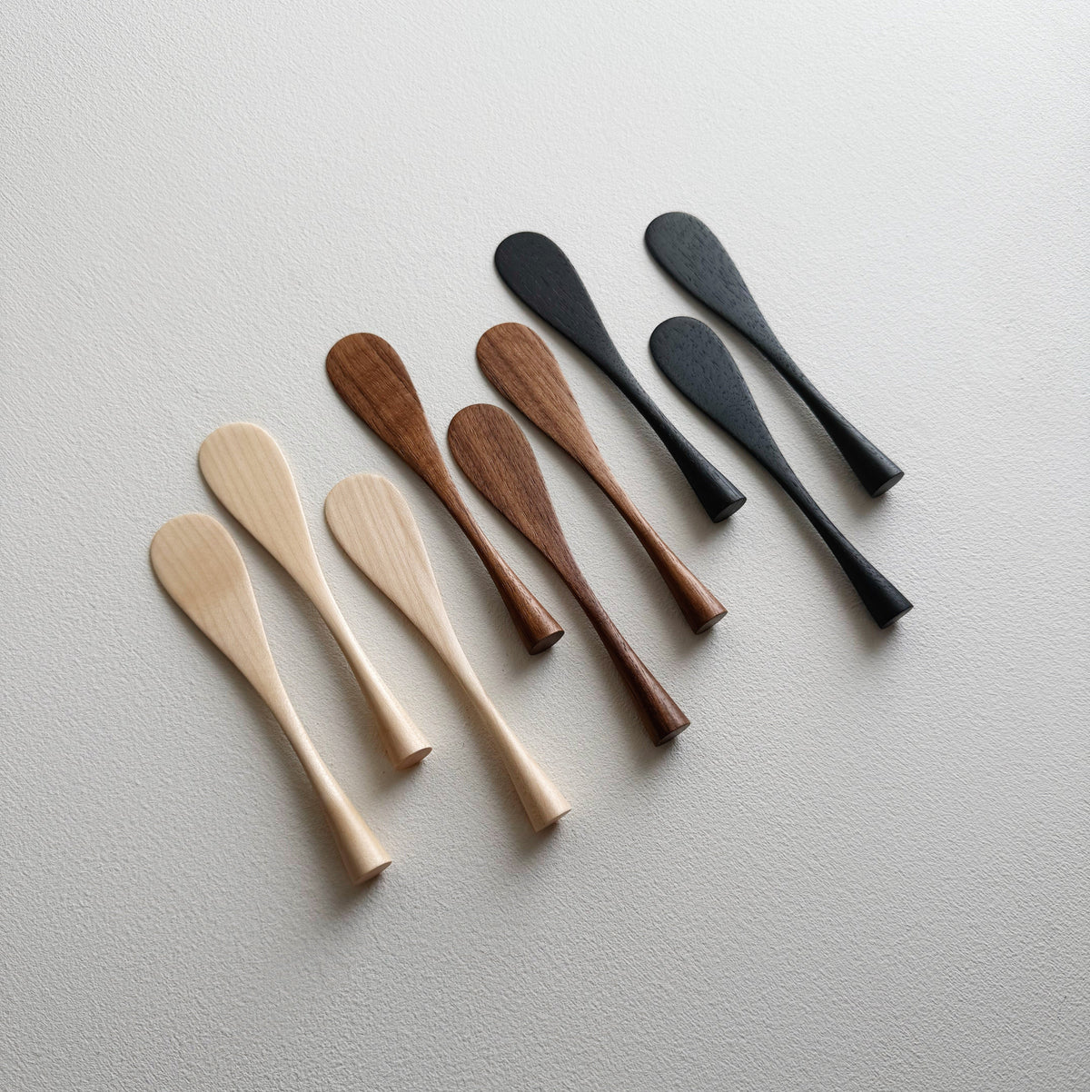 Spreading paddle rounded handle