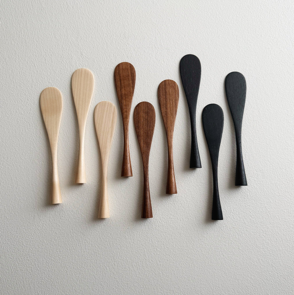 Spreading paddle rounded handle