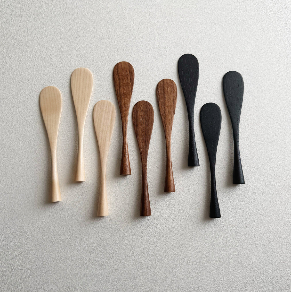 Spreading paddle rounded handle