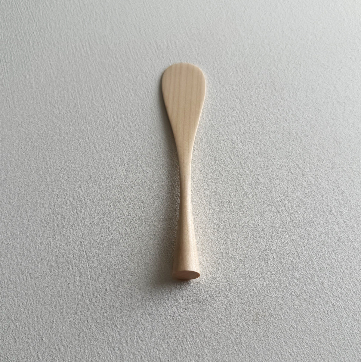 Spreading paddle rounded handle