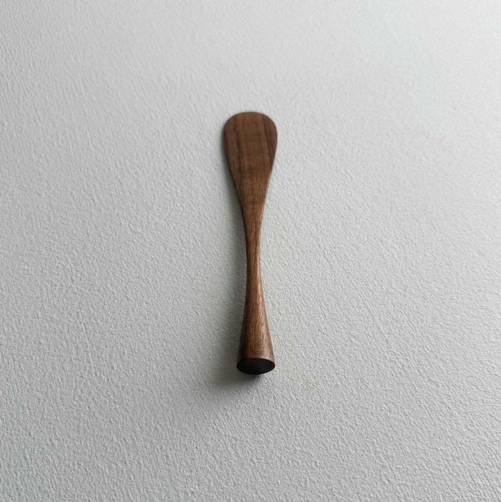 Spreading paddle rounded handle