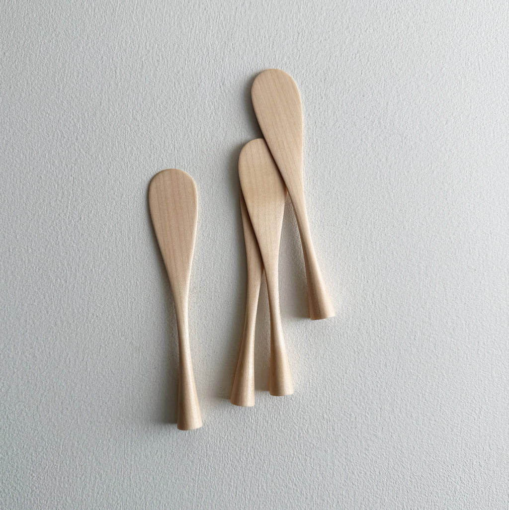 Spreading paddle rounded handle